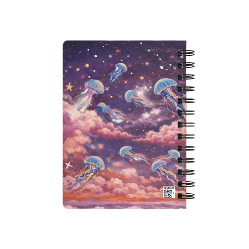 A spiral-bound notebook with a colorful cover illustration of jellyfish in a starry night sky with pink clouds, shown on a plain white background.
