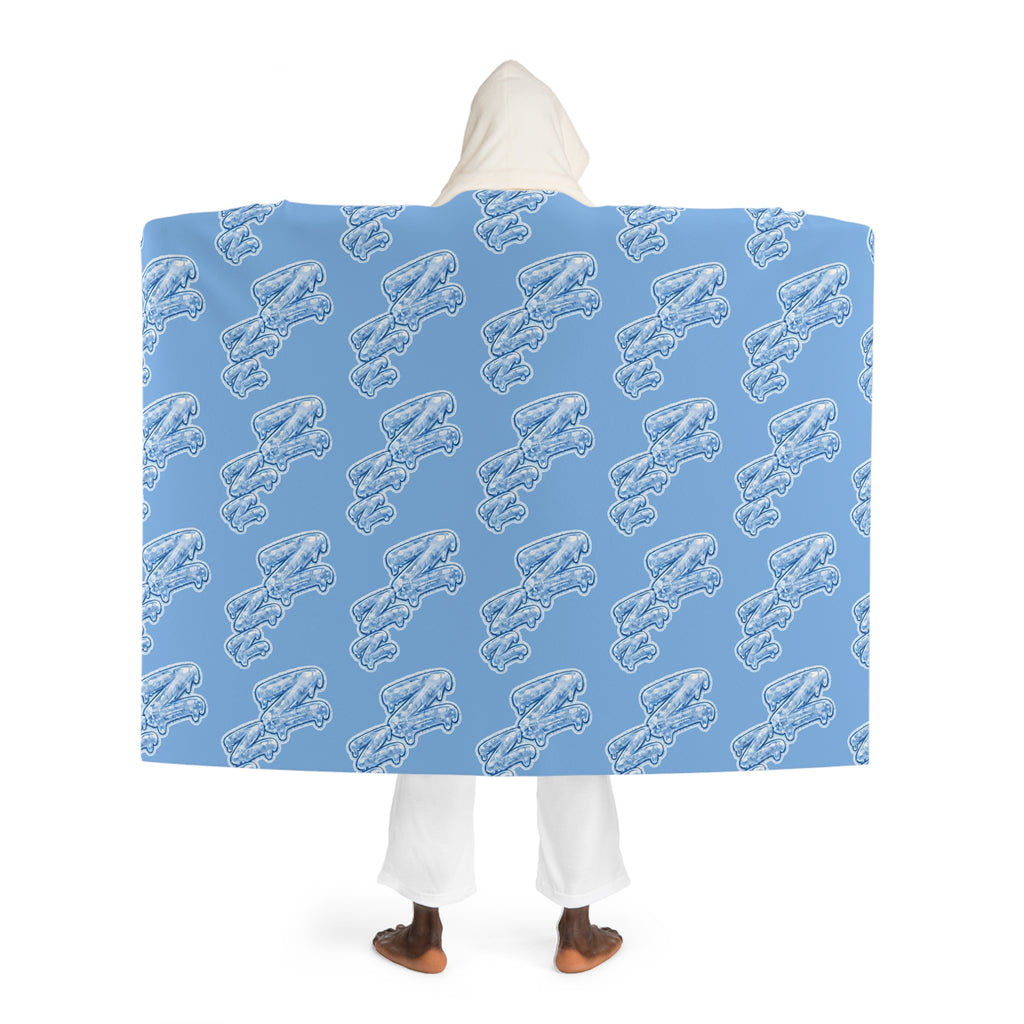 Back view of a person wearing the Cozy Blue Hooded Sherpa Blanket with the signature Frozen ZZZ's pattern against a white background.