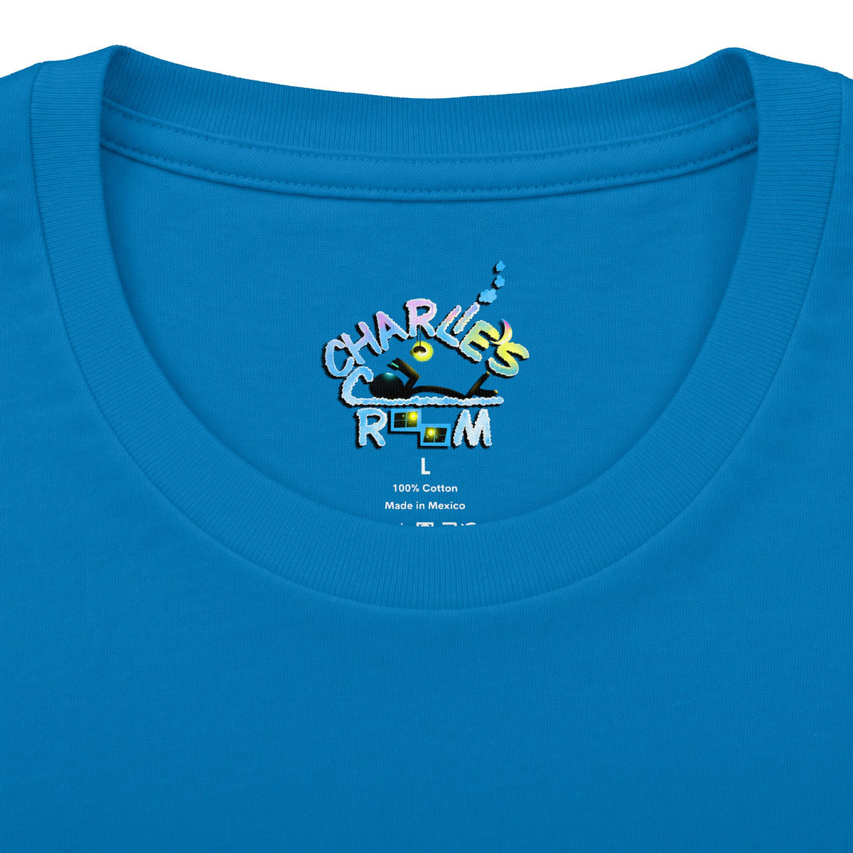 Close-up of a bright blue crewneck t-shirt showing the inner neck print with the Charlie's Cozy Room brand logo, size L, and care details.