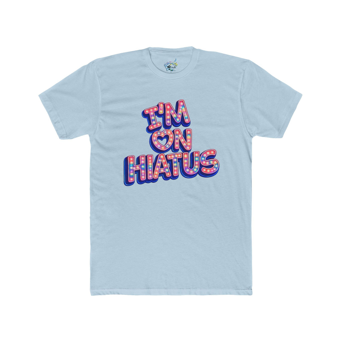 A light blue crewneck t-shirt featuring a retro-style graphic on the chest that reads 'I'M ON HIATUS' in bubble letters filled with a red, pink, and blue pattern.