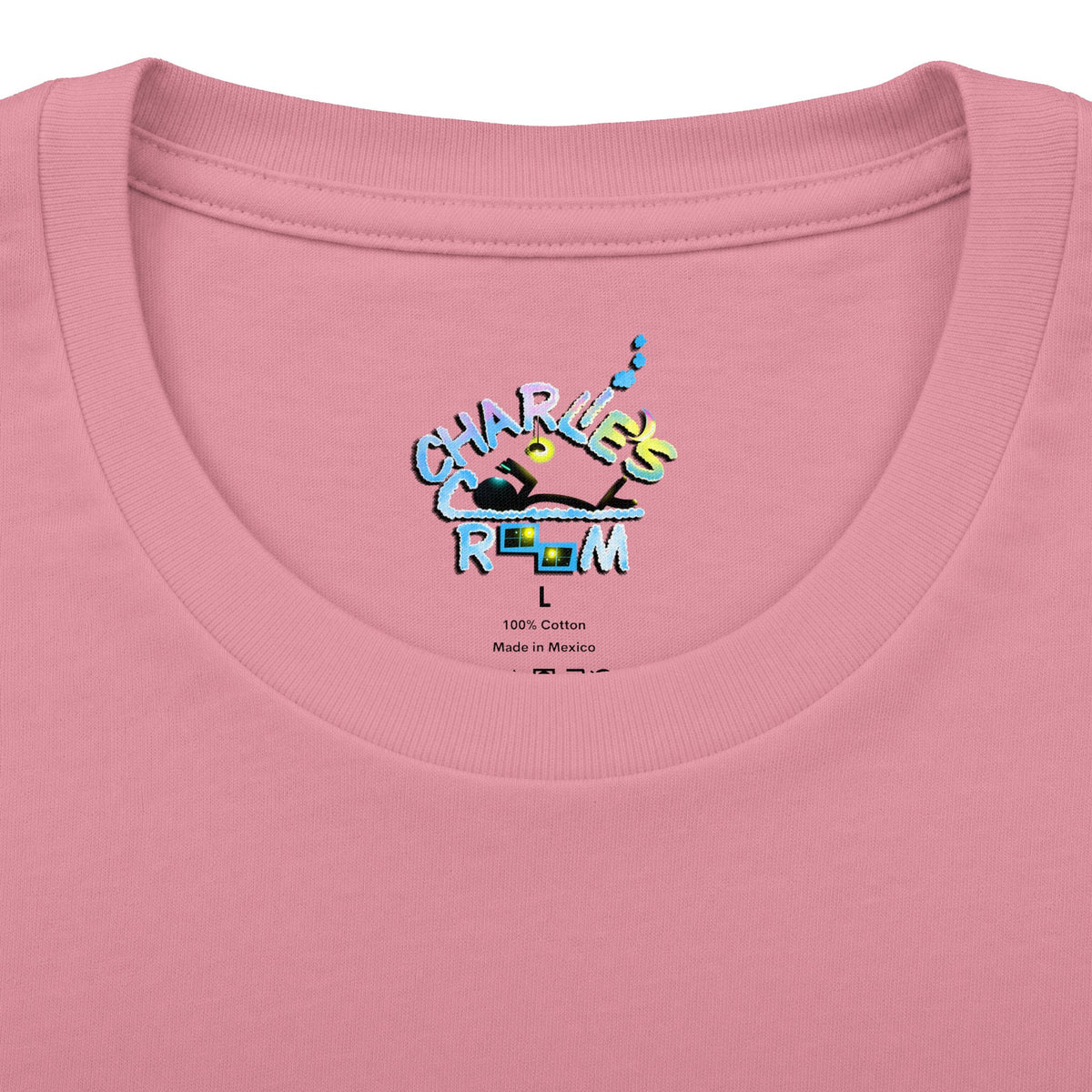 Close-up of a pink crewneck t-shirt showing the inner neck print with the Charlie's Cozy Room brand logo, size L, and care details.