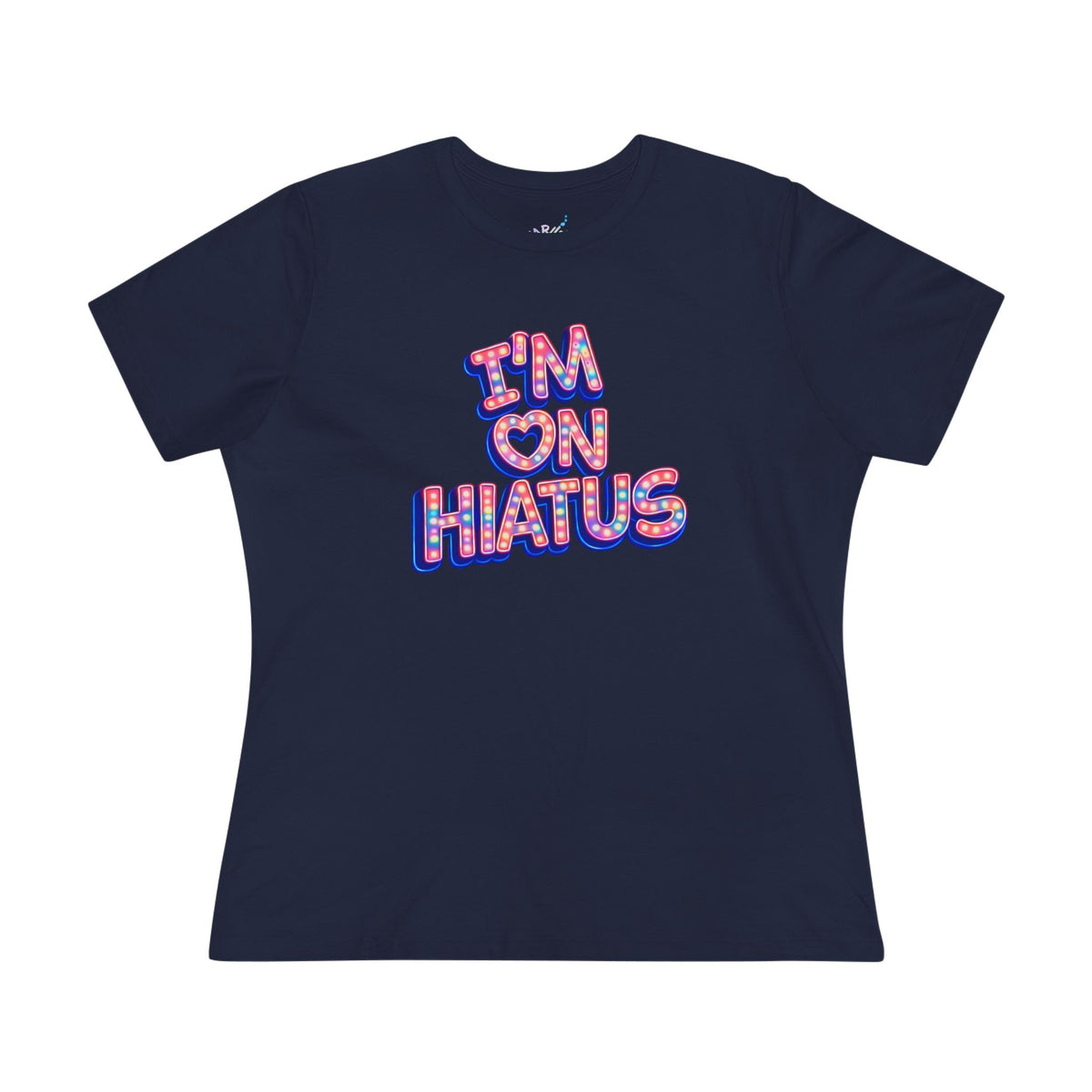 A navy blue short-sleeve t-shirt with a graphic on the front that reads 'I'M ON HIATUS' in a red, white, and blue patterned font, displayed on a solid white background.