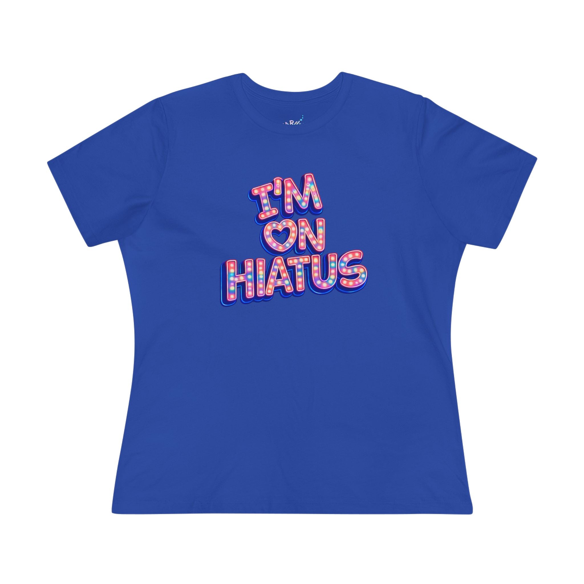 A royal blue short-sleeve t-shirt with a graphic on the chest that reads 'I'M ON HIATUS' in a red, white, and blue polka-dot bubble font, shown against a plain white background.